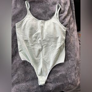Lululemon Ebb to Street Bodysuit*Light Support
B/C Cups
Delicate Mint